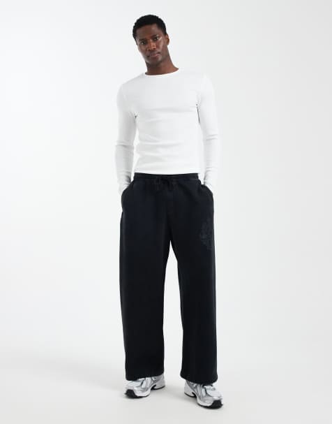 Hollister super baggy graphic joggers in acid black