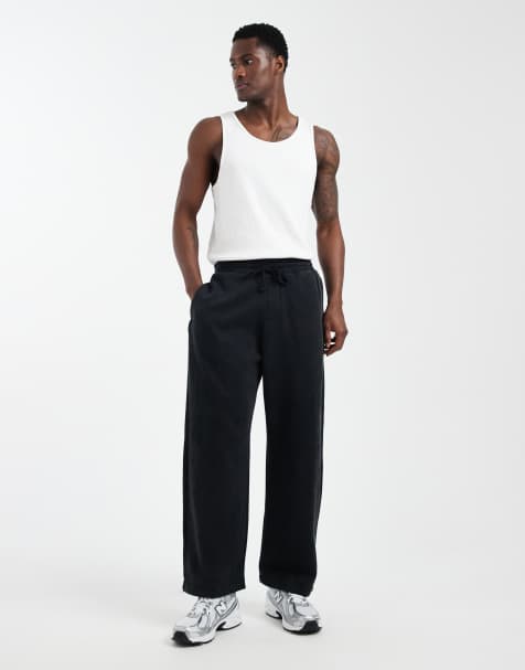 Hollister super baggy graphic joggers in washed black