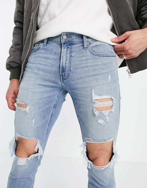 Hollister super skinny fit knee blowout distressed jeans in light wash