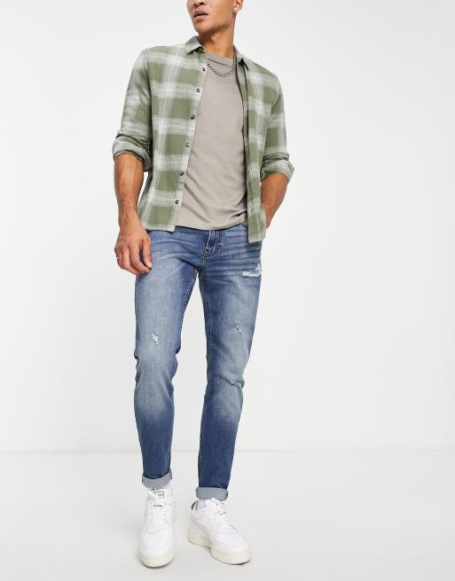 Hollister - Super skinny jeans in distressed model met herstelwerk en medium wassing