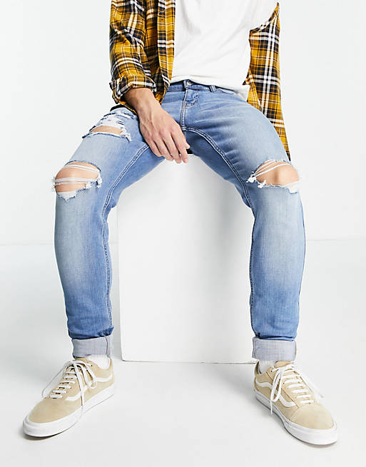 Hollister superskinny stacked fit distressed jeans in bright medium wash