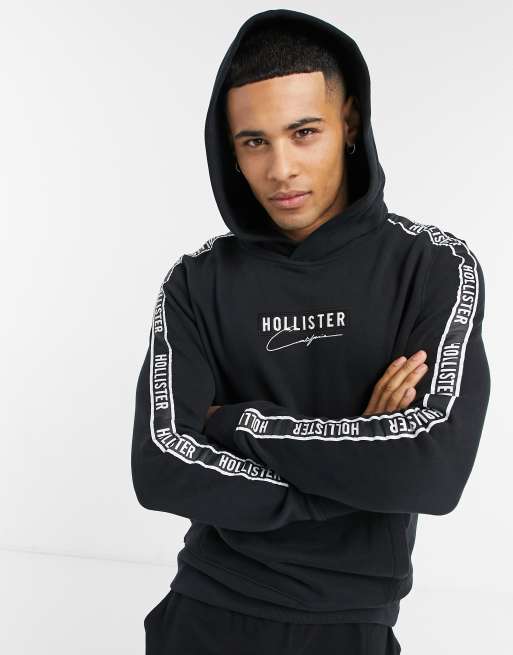 Hollister Sweat capuche d ensemble logo central et bandes sur les manches Noir