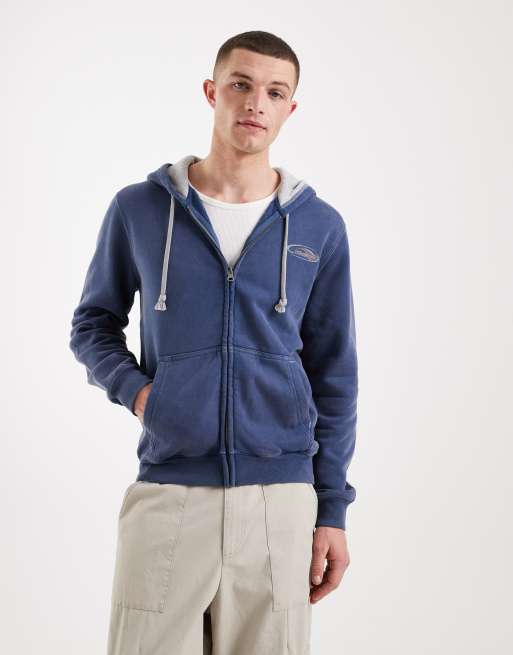 Hollister - Sweat à capuche zippé avec motif sur la manche - Bleu