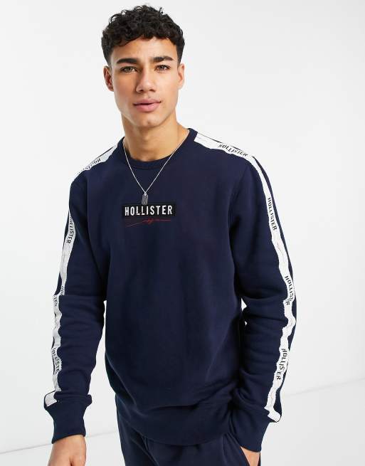 Hollister regular fit hoodie in grey with chest logo and sleeve taping  exclusive to ASOS, ASOS