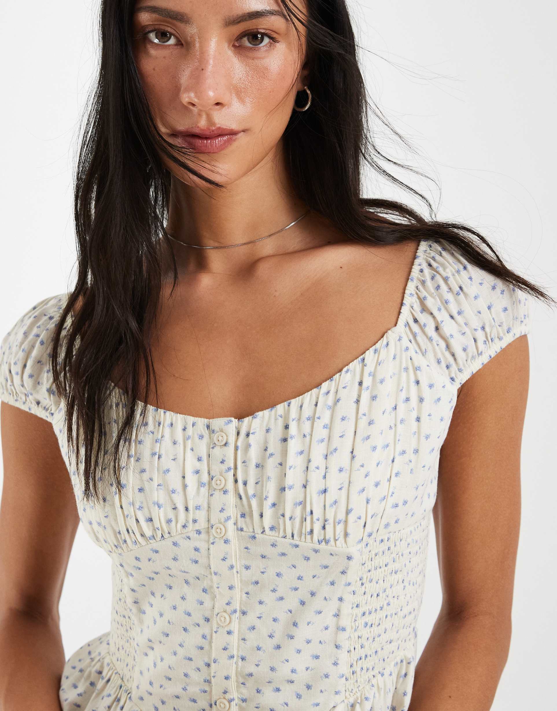 hollister sweetheart neckline peplum top in light yellow ditsy print