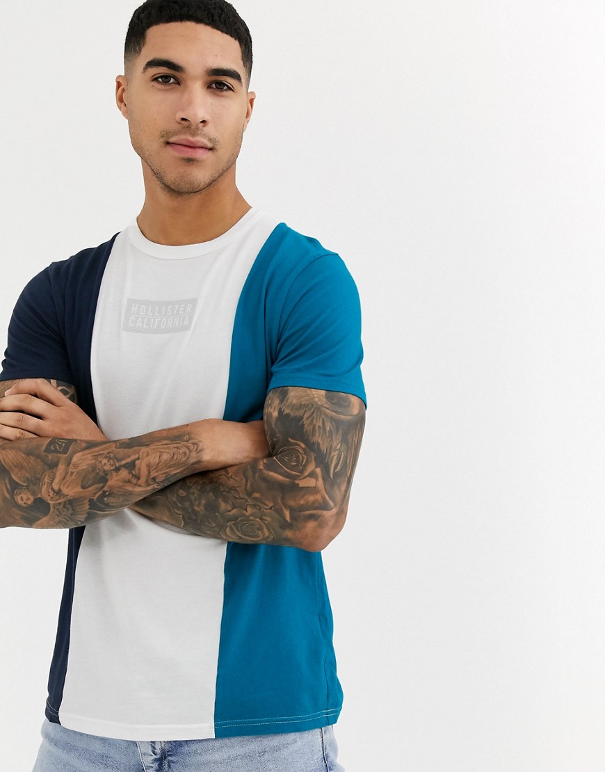 Hollister - T-shirt a righe colour block verticali con logo ricamato blu navy/bianco/turchese-Multicolore