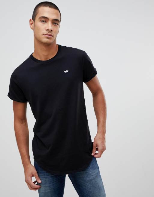 Hollister - T-shirt ajusté uni à ourlet arrondi avec logo mouette - Noir