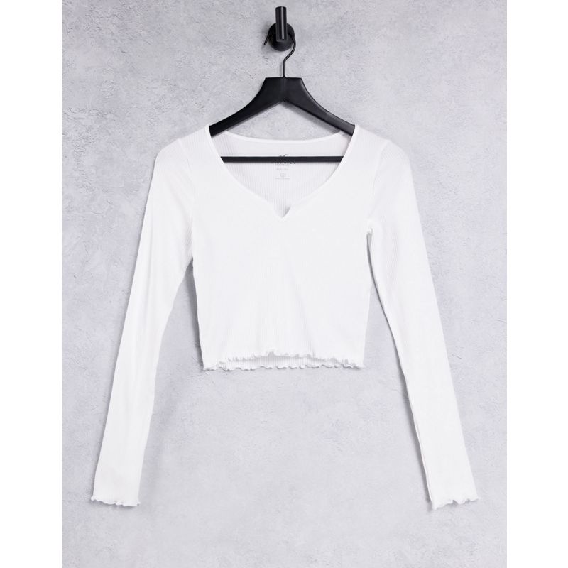Donna Top Hollister - T-shirt bianca a maniche lunghe con bordi ondulati