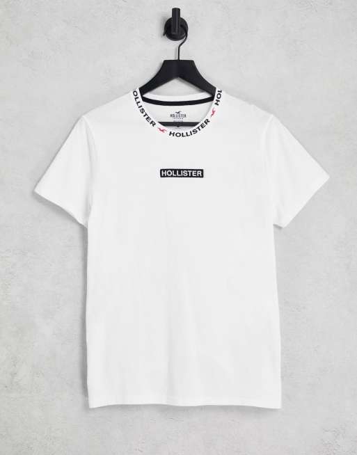 Hollister - T-shirt colorblock nera e bianca con logo centrale e sul bordo
