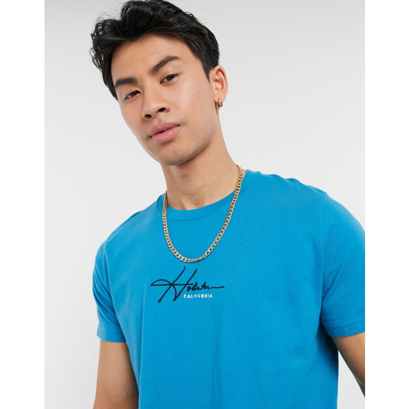 T-shirt e Canotte T-shirt tinta unita Hollister - T-shirt con logo centrale con scritta verde-azzurro