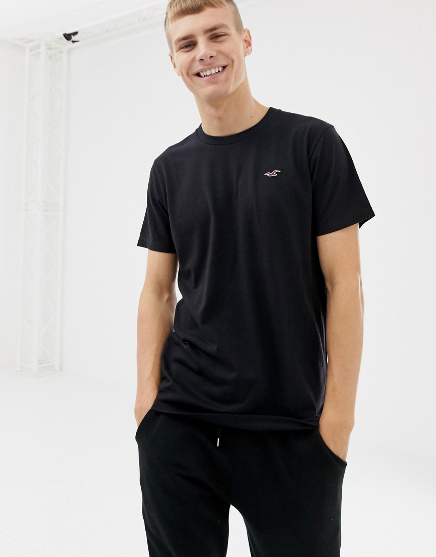 Hollister - T-shirt girocollo con logo gabbiano nera-Nero
