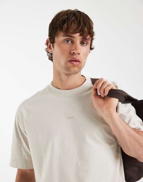 Hollister – T-Shirt in Beige mit Logo auf der Brust - view 1