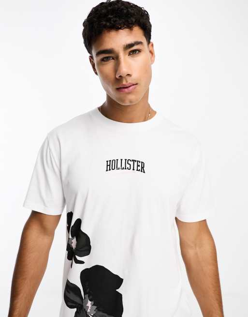 Hollister T Shirt in WeiB mit mittigem floralem Logoprint