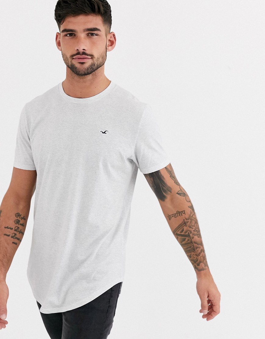 Hollister - T-shirt met ronde zoom en logo in gemeleerd wit