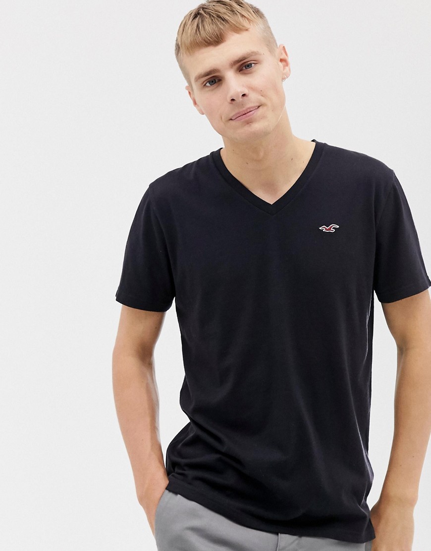 Hollister - T-shirt nera con logo a gabbiano e scollo a V-Nero