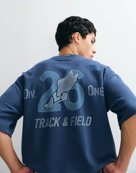 Hollister - T-shirt oversize blu con grafica sportiva sul retro - view 1