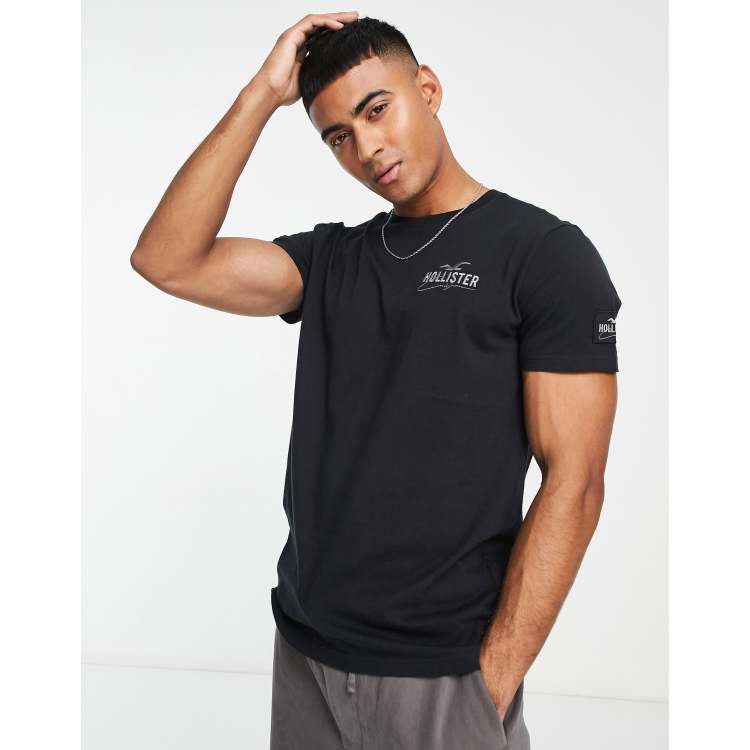 rabat Dusør Ubetydelig Hollister taped hem logo relaxed fit t-shirt in black | ASOS