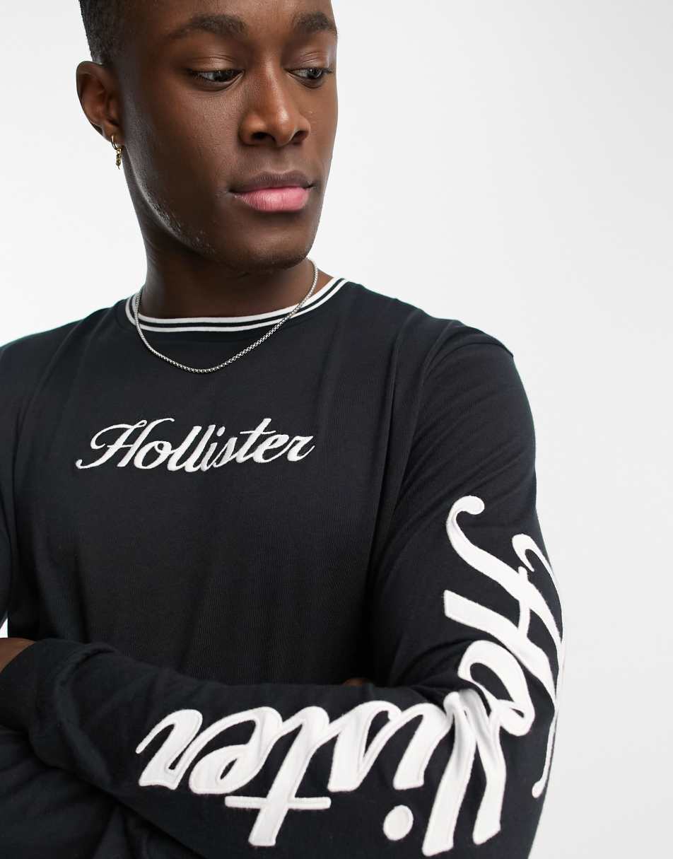 Hollister tipped central & arm logo long sleeve top in black