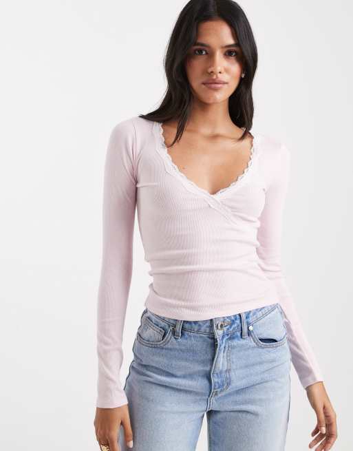 Hollister - Top a maniche lunghe rosa con finiture in pizzo