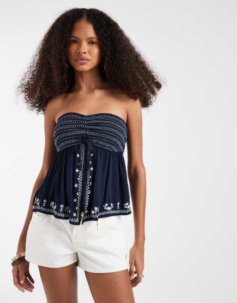 Hollister - Top azul marino estilo babydoll con escote palabra de honor y bajo bordado - view 1