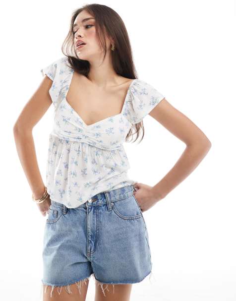 Hollister - Top babydoll blu a fiori con volant sulle maniche - view 1