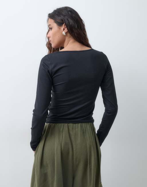 Hollister top de manga larga reversible sin costuras en negro, 5 de 5