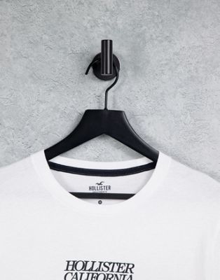 T-shirts et débardeurs Hollister - Top manches longues avec logo centré sur le devant et sur les manches - Blanc