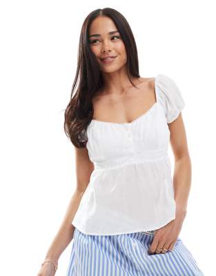 Hollister – Vit babydoll-topp med korta puffärmar och knäppning - view 1
