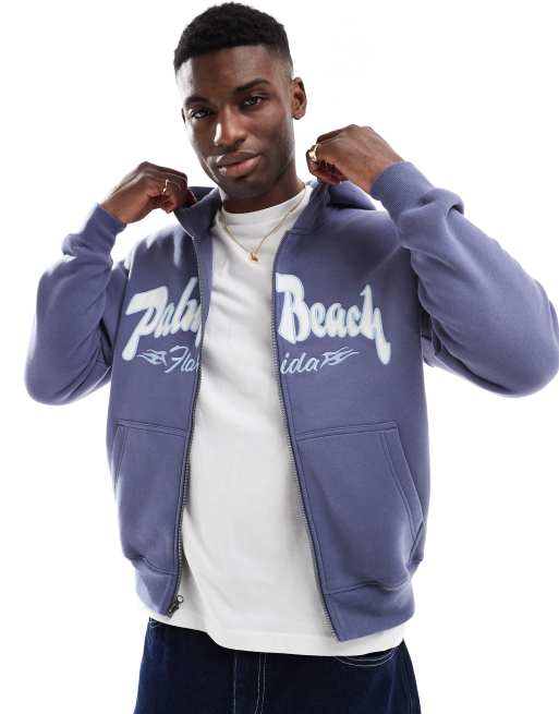Hollister – Weit geschnittener Kapuzenpullover in Marineblau mit durchgehendem Reißverschluss und Motiv am Rücken