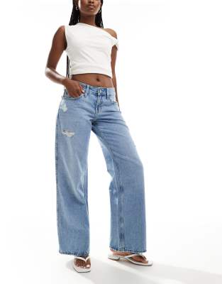 Hollister - Weite Jeans in Mittelblau mit tiefem Bund und Abnutzungsdetails