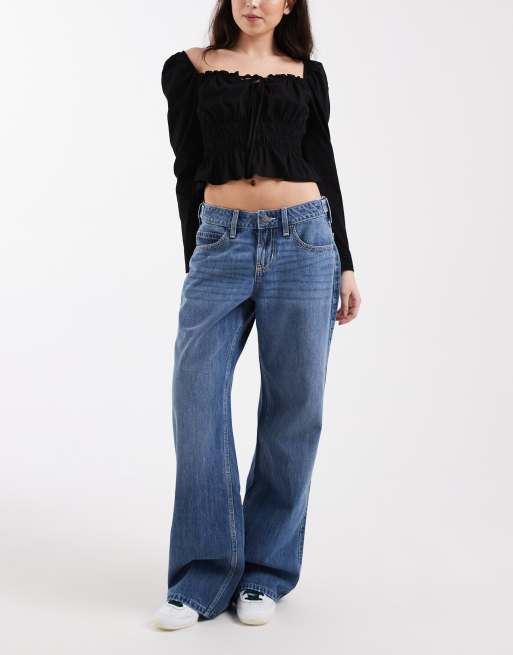 Hollister – Weite Jeans in mittelblauer Waschung mit niedrigem, verstellbarem Bund