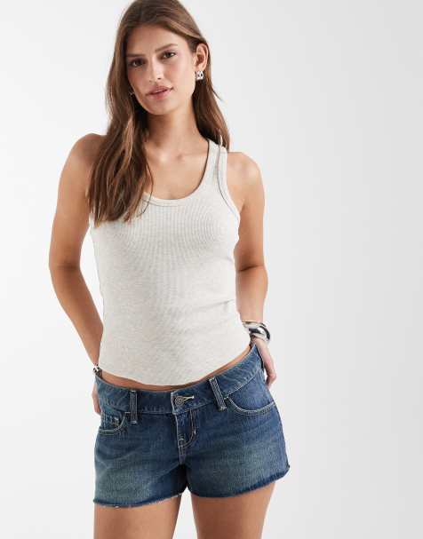 Hollister Y2K low waist denim shorts with polka dot detail waistband in blue wash - view 1