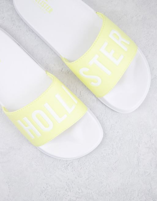 Hollister – Żółte klapki z logo