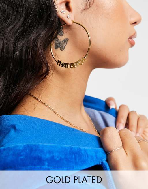 Hoops + Chains LDN hoops with 'that bitch' slogan in 18kt waterproof gold plate