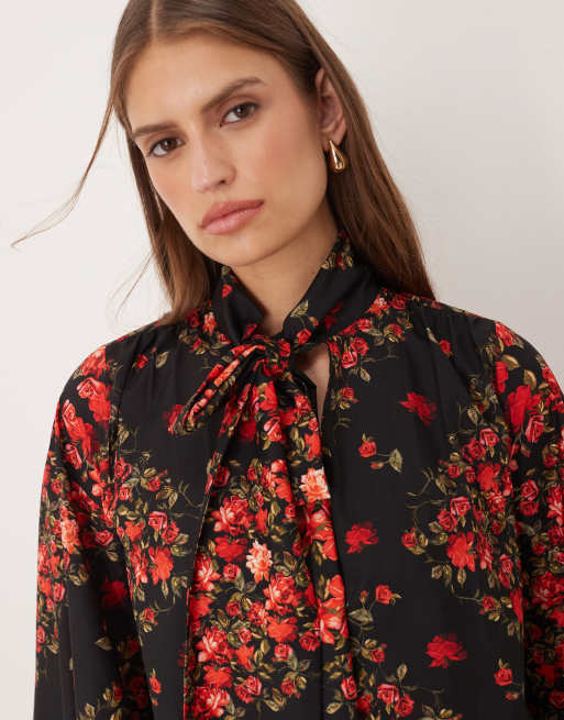 Hope & Ivy balloon sleeve blouse with tie neck in black and red floral