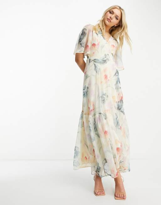 Hope & Ivy - Lange jurk met overslag, fladdermouwen en bloemenprint in crème