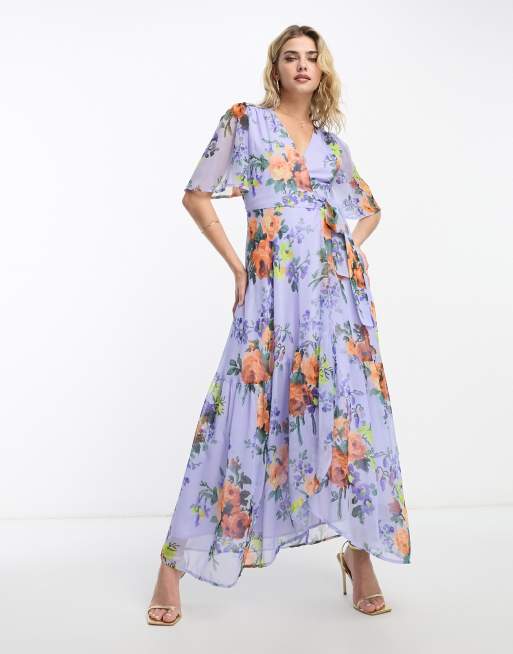 Hope & Ivy – Liliowa kopertowa sukienka midaxi z rozkloszowanymi rękawami i wzorem w kwiaty