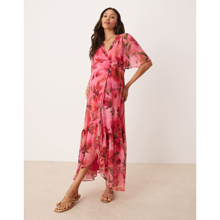 Hope & Ivy Maternity flutter sleeve maxi wrap dress in pink floral | ASOS