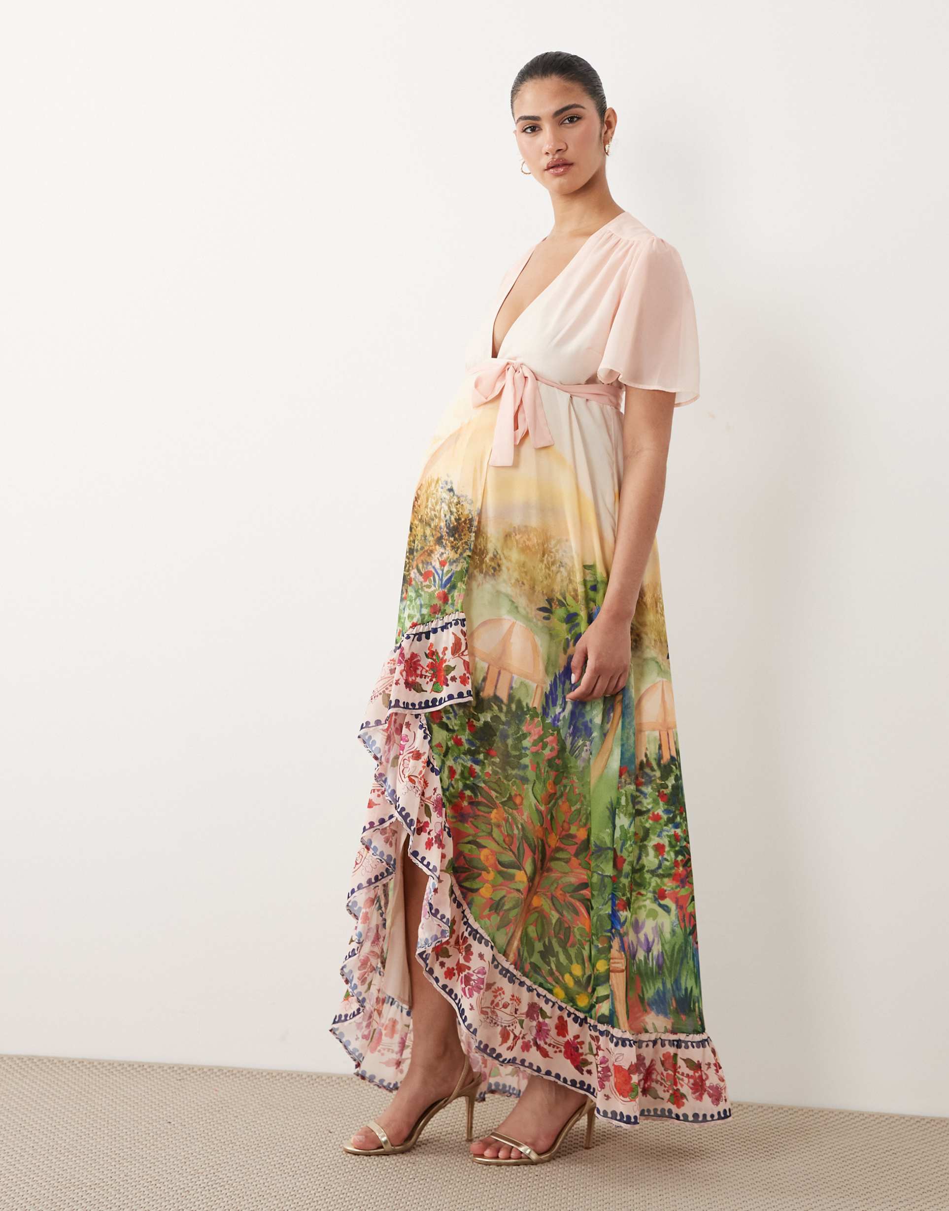 hope & ivy maternity flutter sleeve wrap maxi dress in pink floral border scene