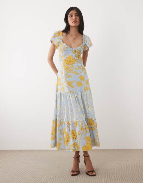 Hope & Ivy Midikleid aus Baumwolle mit gesmokter Brustpartie, Bindeband am Rücken und Mix-Print in Blau und Gelb mit Blumenmuster - view 1