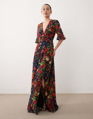 Maxikleid in Marineblau mit Blumen- und Punktemuster, Rüschenärmeln, oberschenkelhohem Schlitz und Rückenausschnitt Marineblau 34