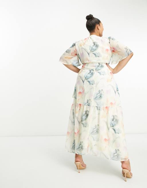 Hope & Ivy Plus flutter sleeve wrap maxi dress in cream floral | ASOS