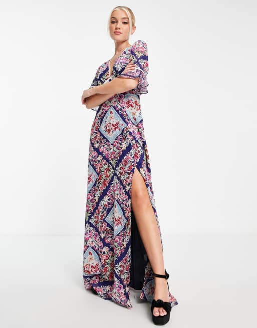 Hope & Ivy - Priya - Veelkleurige maxi-jurk met open achterkant