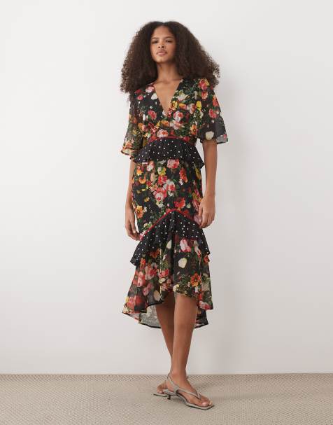 Hope & Ivy - Sort tea-kjole i midilængde med peplum-talje og polkaprikker samr blomstermønster - view 1
