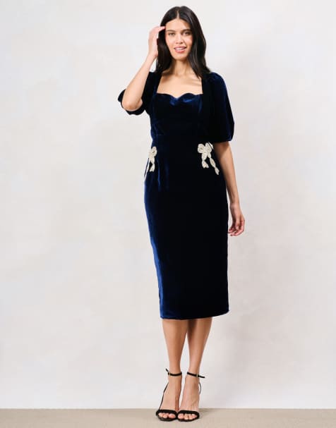Hope & Ivy The averie puff sleeve velvet midi pencil dress with embellished bows in dark blue - view 1