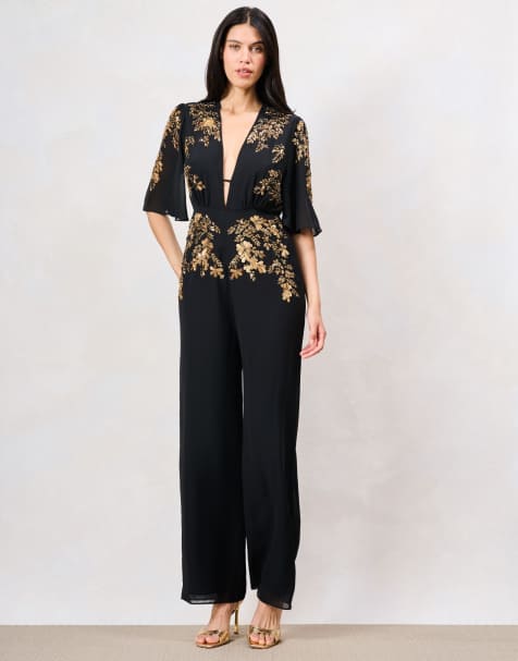 Hope & Ivy The jianna plunge front embellished jumpsuit with flutter sleeve in black and gold - view 1