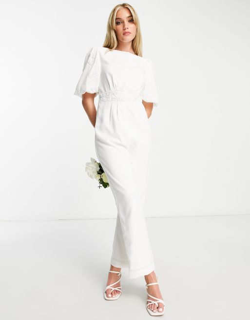 Hope & Ivy - Tuta jumpsuit da sposa color avorio con maniche a sbuffo e fiocco sul retro