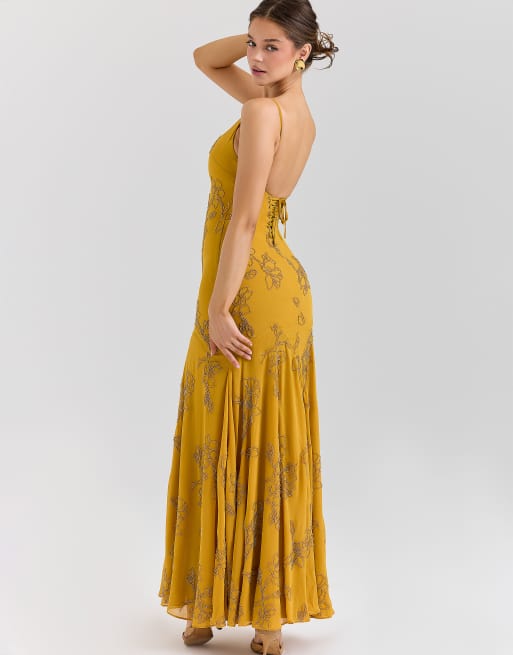house of cb gold dress The body foil bandage maxi in gold shimmering tones and exotic pattern House of CB Rose Gold