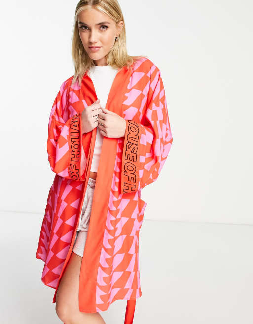 House of Holland – Morgenmantel mit Fledermausärmeln und abstraktem Muster in Rot und Rosa
