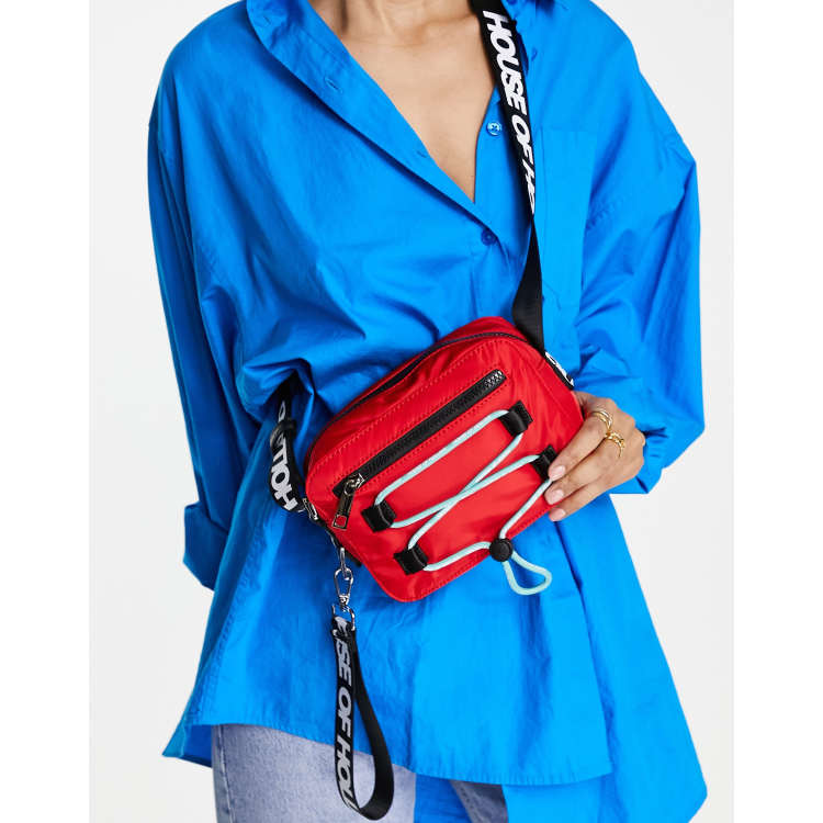 House of Holland – Umhängetasche aus Nylon in Rot mit Logoband ASOS